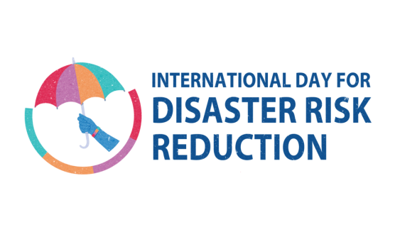 Image of a blue arm holding a colourful umbrella with the text International Day for Disaster Risk Reduction