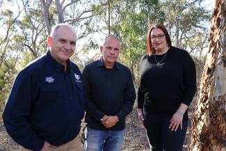 An image of Joe Buffone PSM (Deputy Coordinator-General, NEMA), Tyronne Bell (Ngunawal Descendant) and Alex Frawley (Chair, Diversity and Inclusion Network, NEMA)